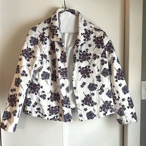 White suit jacket with purple flower accents. Fully lined for cooler months.